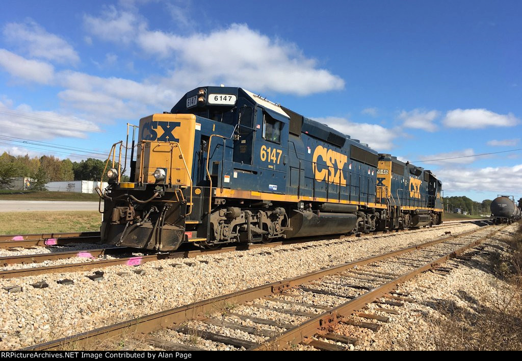 CSX 6147 and 2648 run light